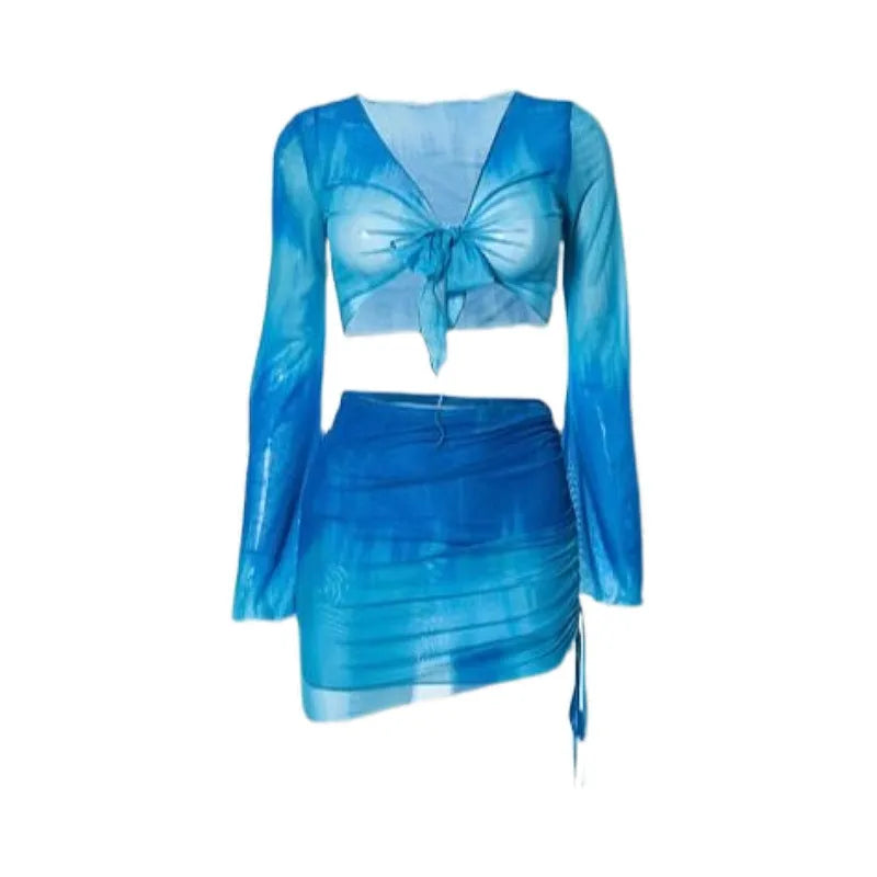 Women's blue high-waist bikini set with shirt, bra, underwear, and skirt laid flat.