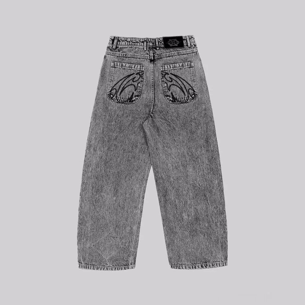 Grey loose fit straight-leg denim trousers for men and women on a neutral background