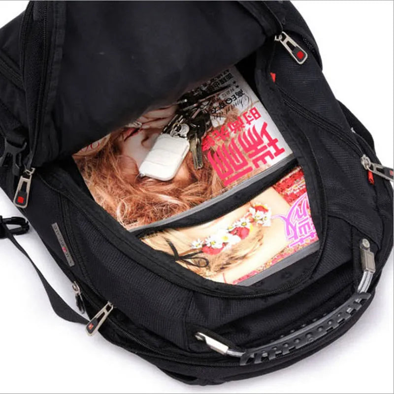 Black business backpack open to show three internal compartments and laptop sleeve