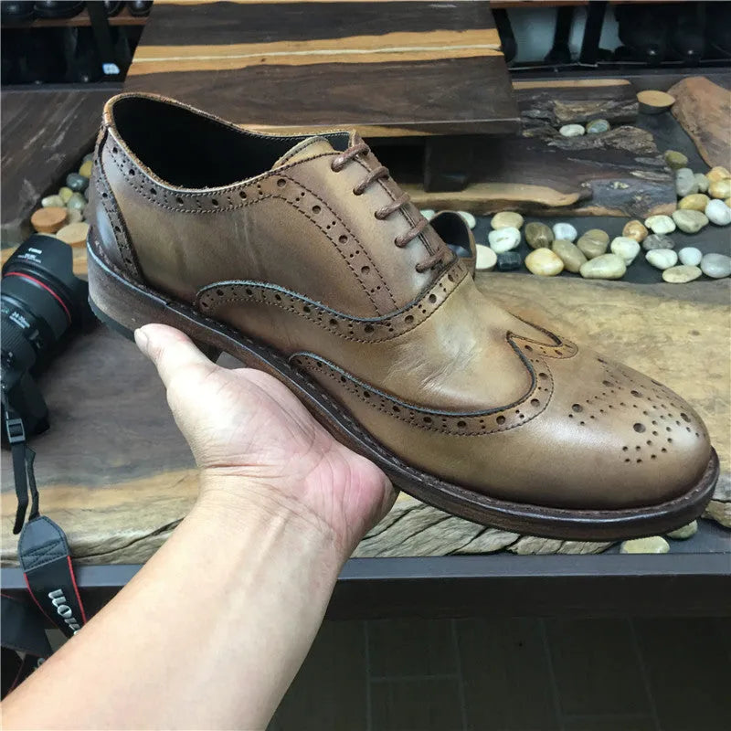 Light brown men's distressed leather casual shoes with lace-up closure and round toe.