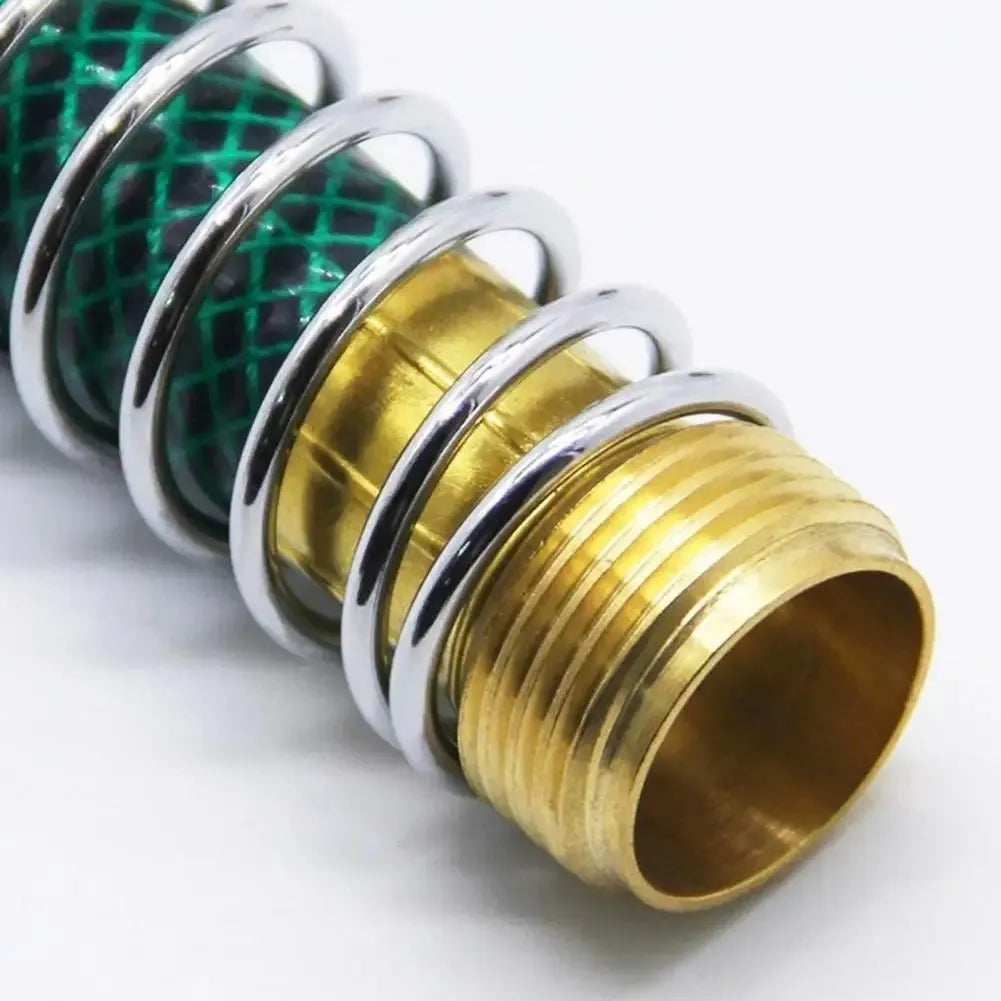Brass garden hose connector with a visible silver spiral spring and 3/4 inch threaded ends.