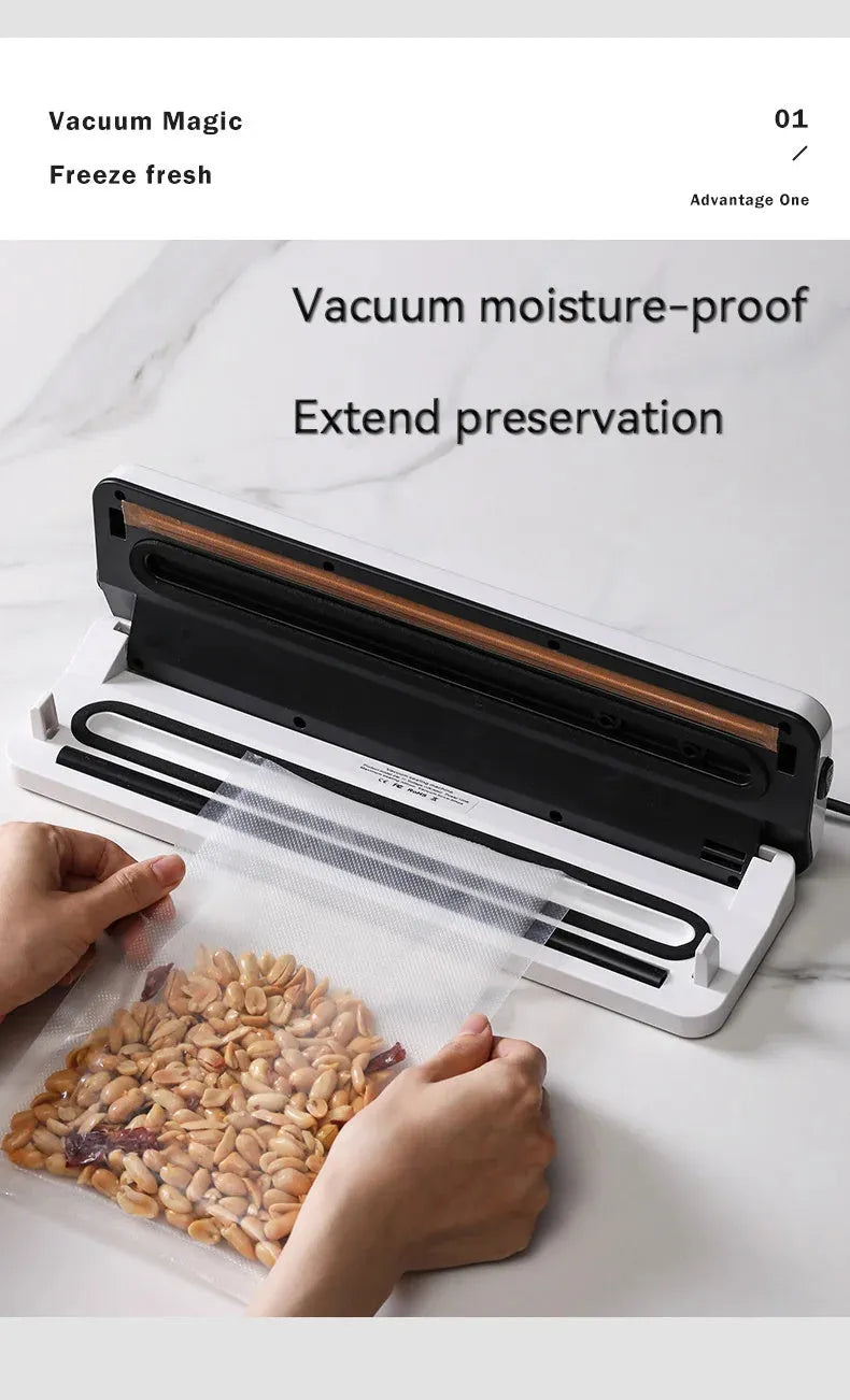 White automatic household vacuum sealer machine on a kitchen countertop.