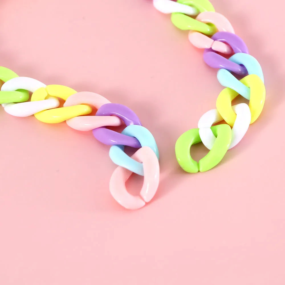 Plastic chain pet collar in macaron candy colours with adjustable sizing for special occasions
