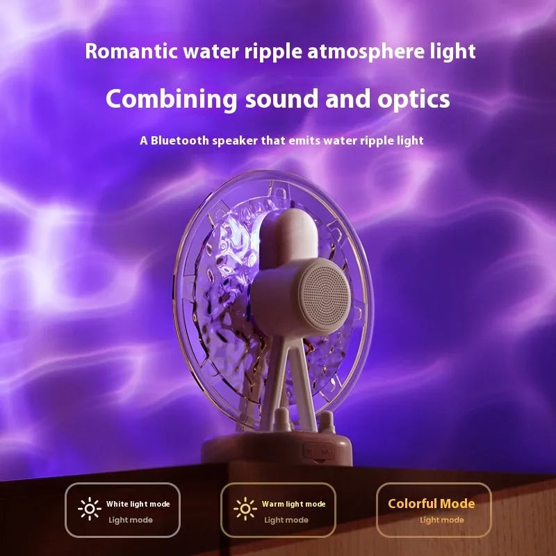 Ferris wheel water ripple Bluetooth speaker with colourful atmosphere light in pink on a white background