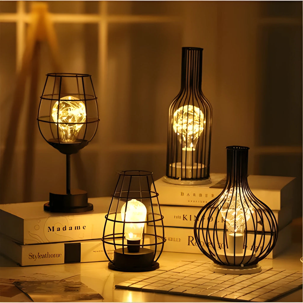 Minimalist hollow table lamp with wrought iron shell in red wine glass style emitting warm white LED light