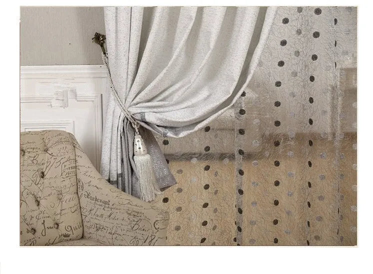 Simple blackout curtain panel showing light-blocking fabric with hook hanging option