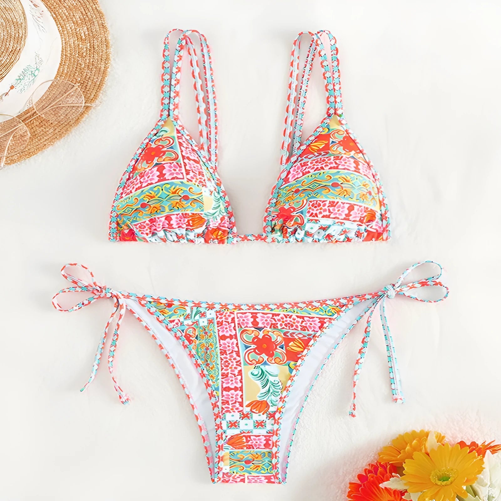 Women's lace-up split swimsuit in picture colour, showing backless brief design for swimming.