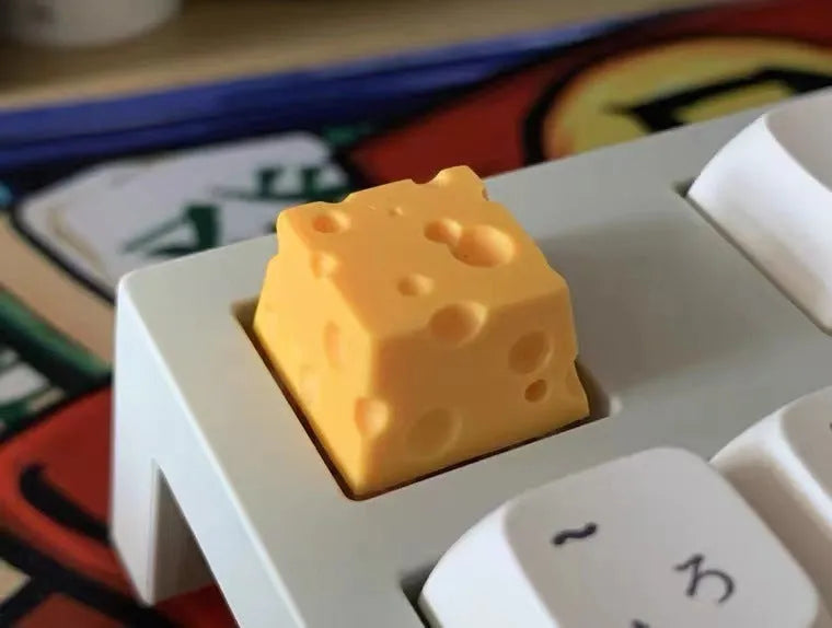 Yellow resin cheese wedge key cap for mechanical keyboards with Cherry MX compatibility