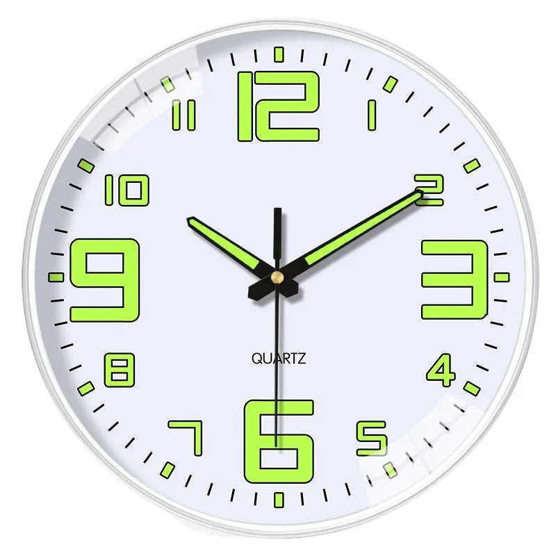 Modern 8 inch diameter luminous wall clock with plastic shell on a wall.