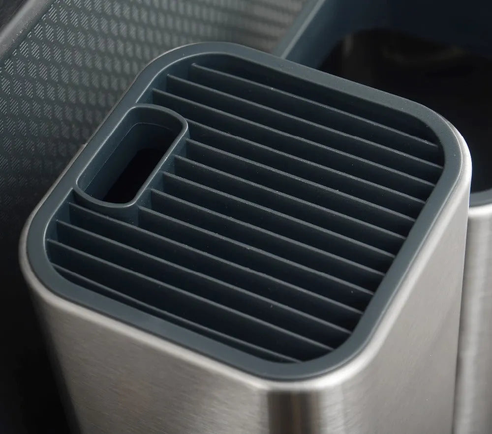 Stainless steel kitchen knife holder with a white polypropylene storage bucket and detachable base
