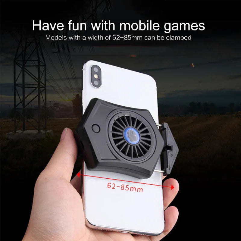 Black and white mobile phone radiator cooling fan clipped onto a smartphone.