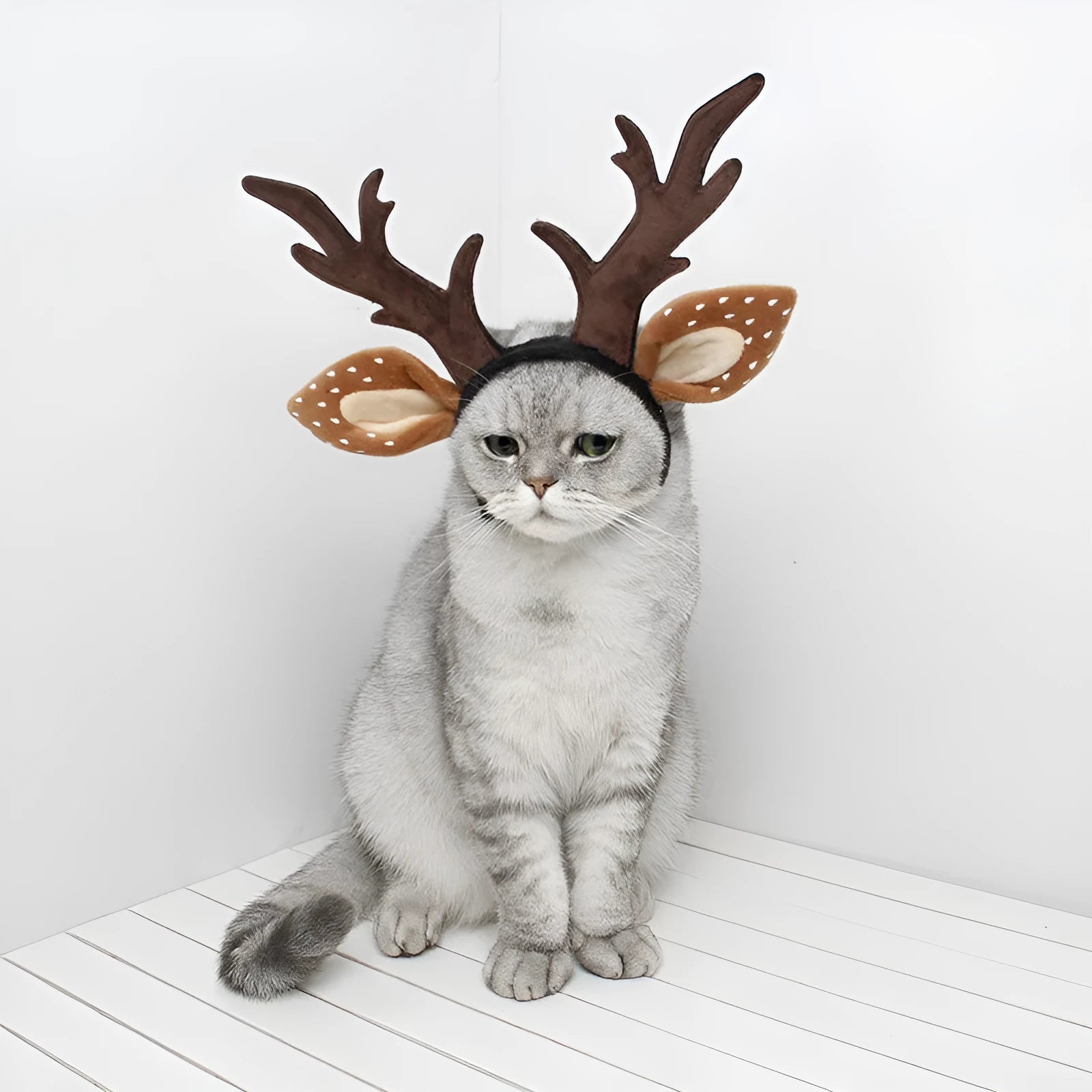 Brown polyester deer antler holiday anti-slip headband on display