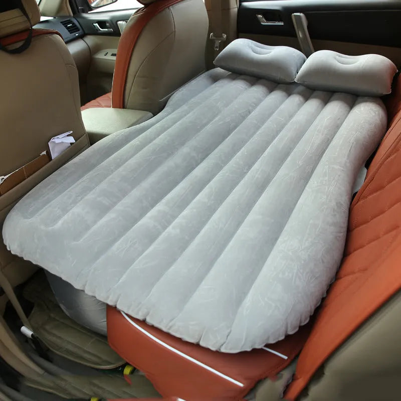 Car inflatable bed with ultra-thickened 0.5mm flocking cloth in Black Wave colour, shown inflated in rear of five-seater car