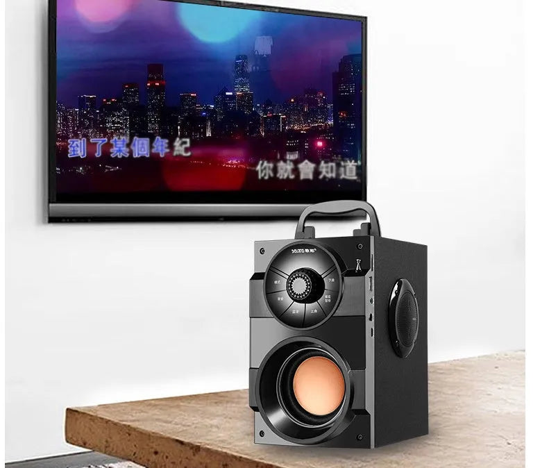 Black portable mini home audio speaker system with subwoofer and 3.5mm audio cable