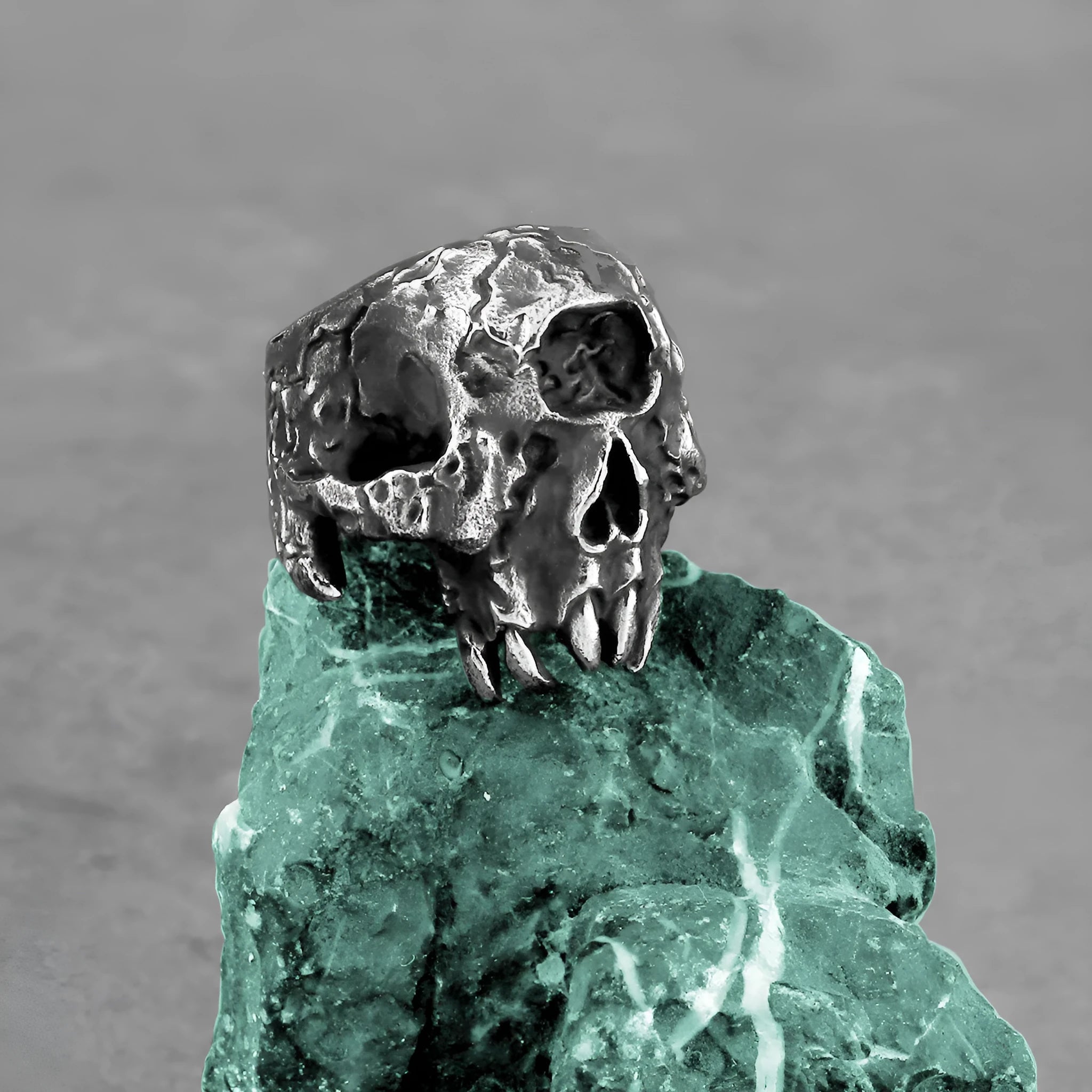 Alloy ring with a one-eyed skull design in a retro hip hop punk style.