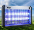 Electric mosquito killing trap lamp with UV light and metal grid for indoor insect control.