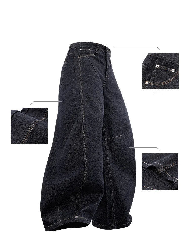 Men's wide leg denim trousers in original cow colour, showing mid waist and relaxed fit.