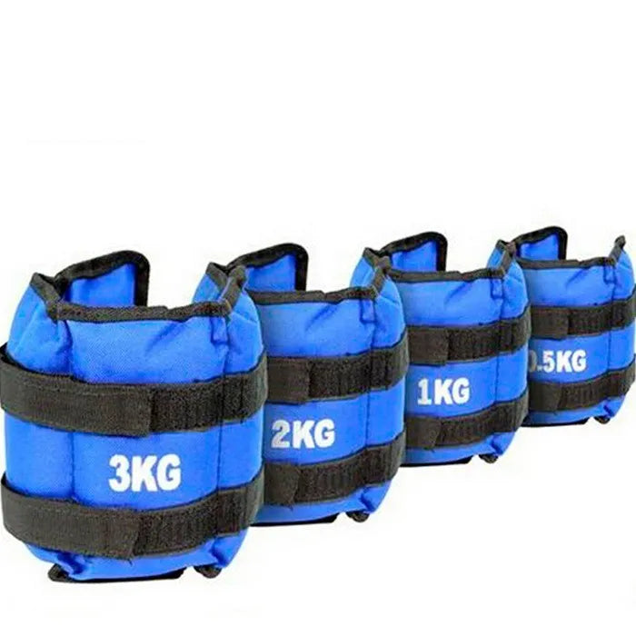 Pair of Oxford cloth legging sandbags for weighted athletic training on a track.