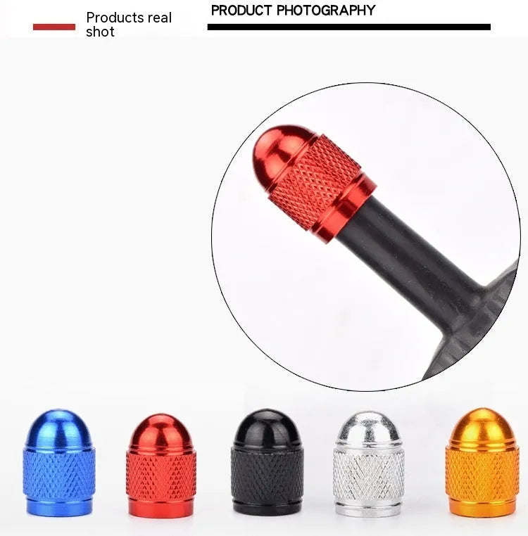 Anodised aluminium mountain bike tyre valve cap in one of five colours: black, blue, gold, red, or silver.