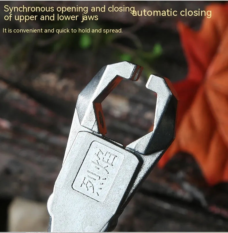 Close-up of a zinc alloy archery release aid showing the harpoon clip and trigger mechanism.