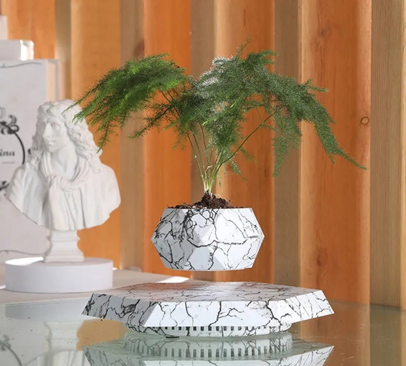 Levitating plant pot marble colour floating with magnetic levitation base