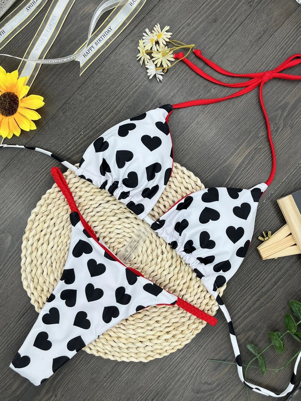 Women's backless split swimsuit with heart printing in nylon and cotton.