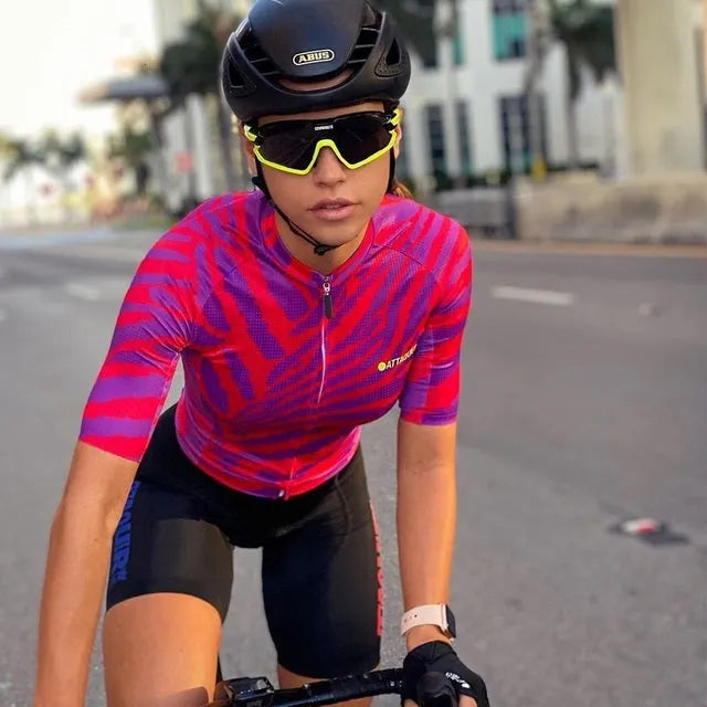 Attaquer women's All Day Kaleidoscope cycling jersey and pants set on a model