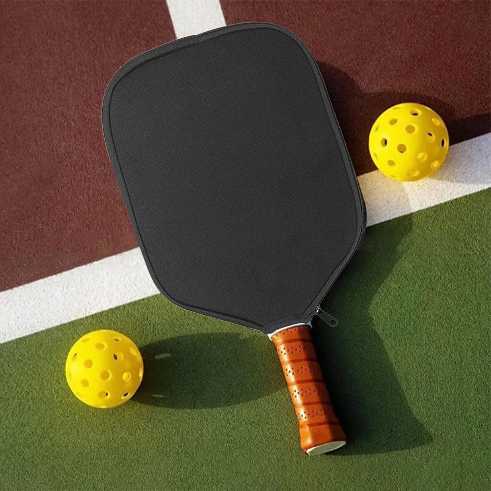 Black neoprene protective sleeve for a table tennis racket on a plain background
