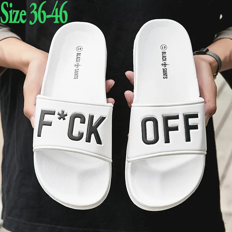 Men's black and white open toe slippers with a rubber sole, shown in large sizes.