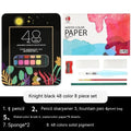 Solid watercolour paint set showing 48 colour pans with black knight, girl pink and sunshine blue shades