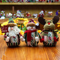 Red, green and white flannel Christmas snowman wall hanging decoration measuring 18 by 13 cm