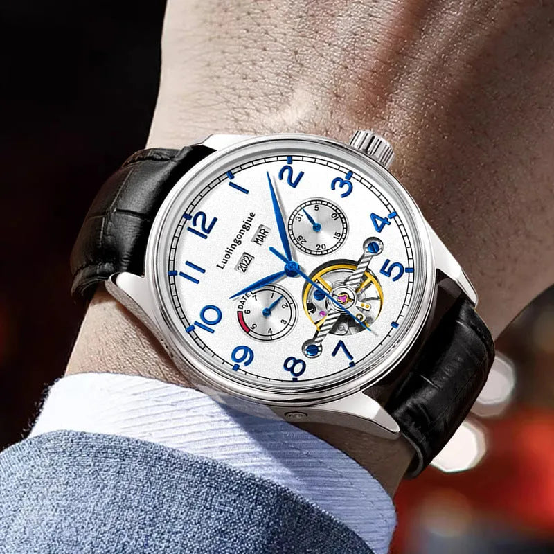 Men's stainless steel business mechanical watch with hollow skeleton dial and leather strap.