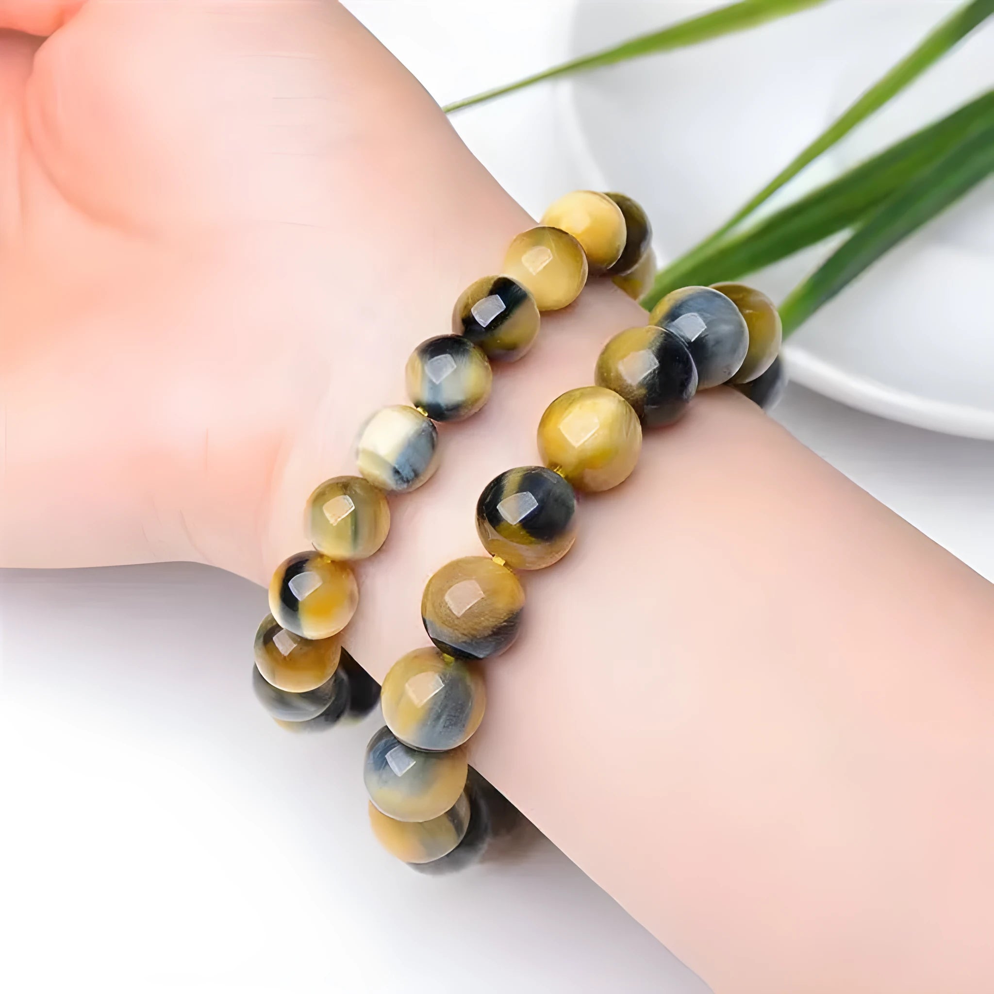 Natural agate fantasy tigereye round bead bracelet on white background, unisex handmade single-circle style