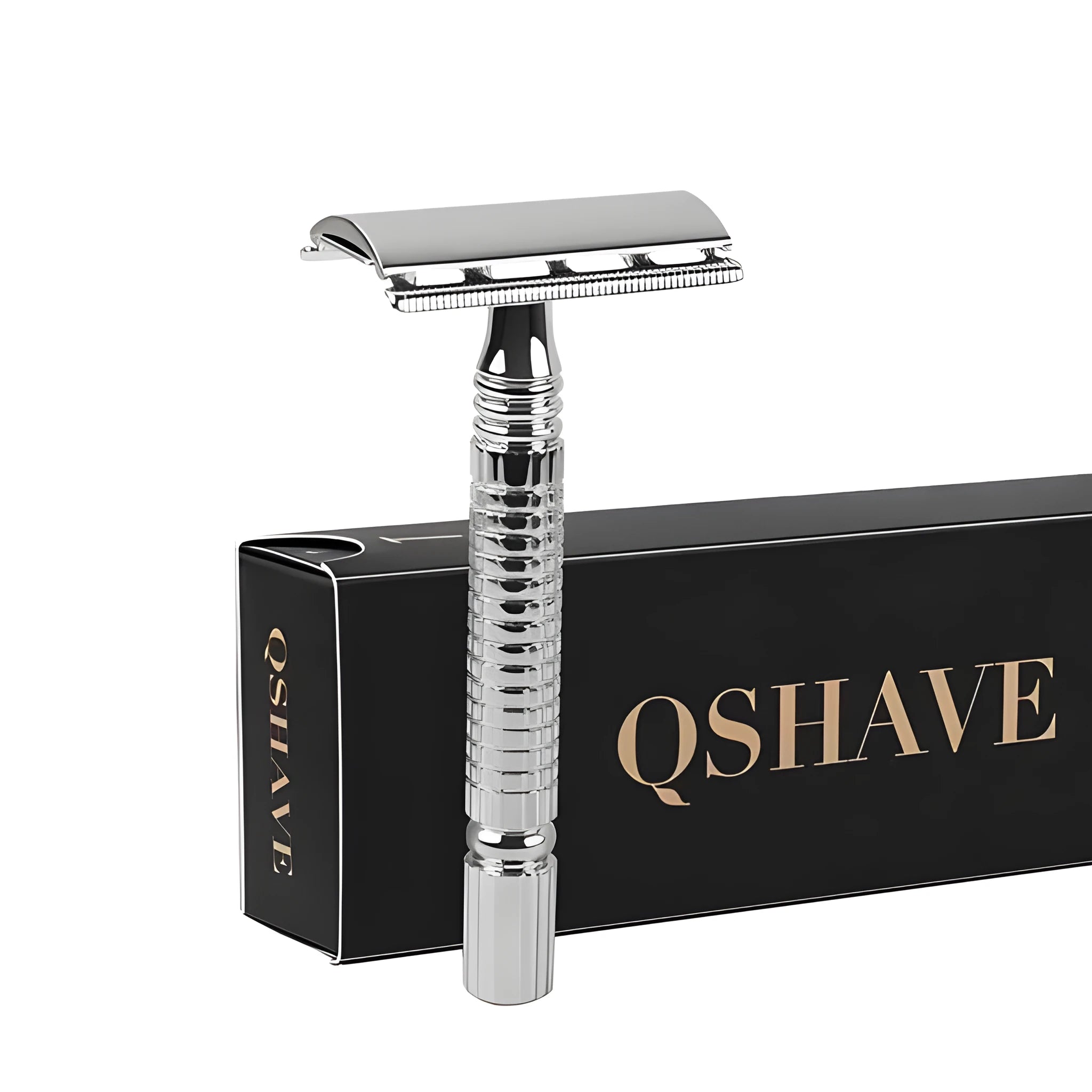 Chrome double edged safety razor with brass handle and closed comb head on storage box.