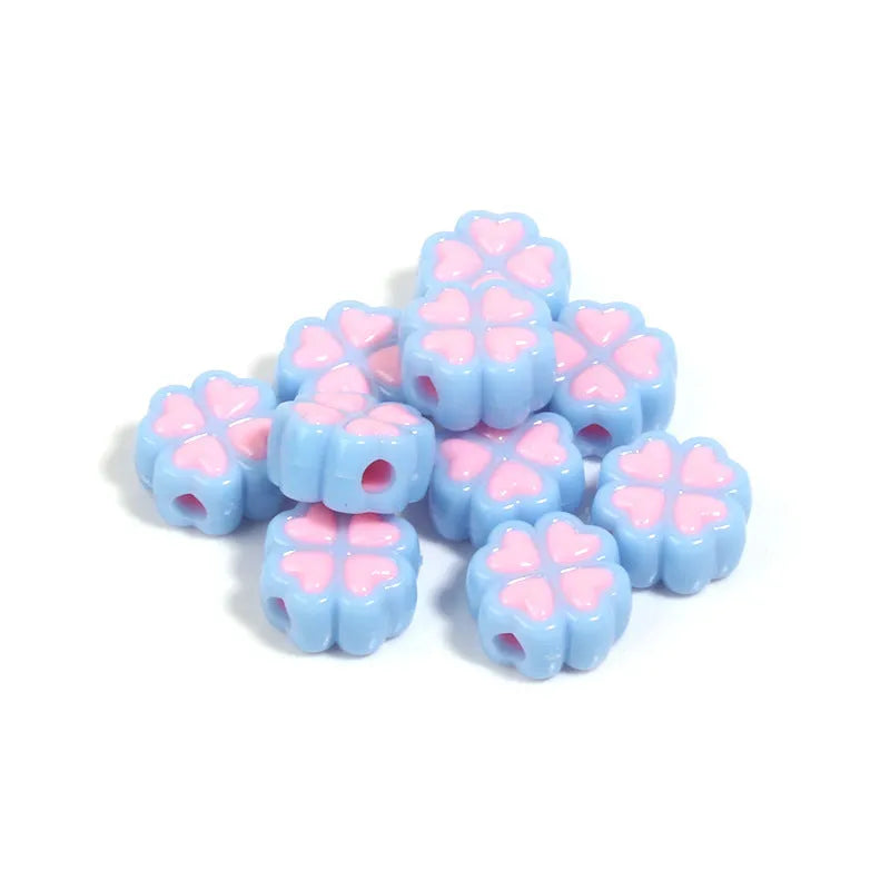 Assortment of 15mm frosted acrylic four-leaf clover beads in pink, yellow, green, blue, purple, and rose red.