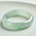 Natural jade bracelet light sun green colour unisex sizes 53 to 64