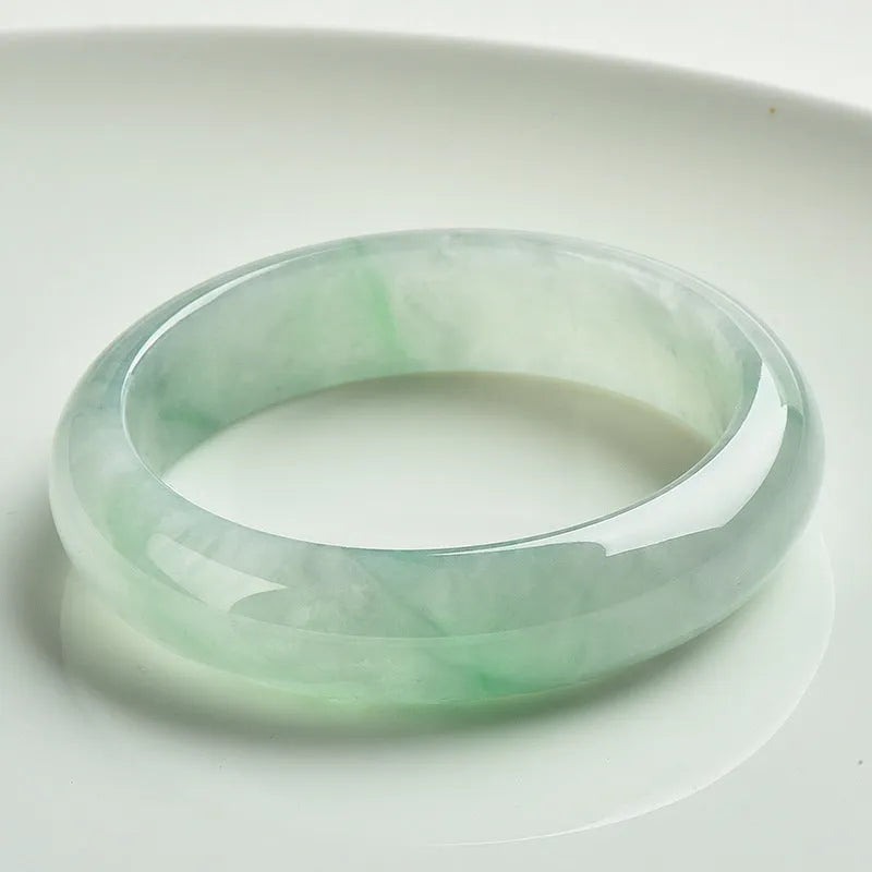 Natural jade bracelet light sun green colour unisex sizes 53 to 64