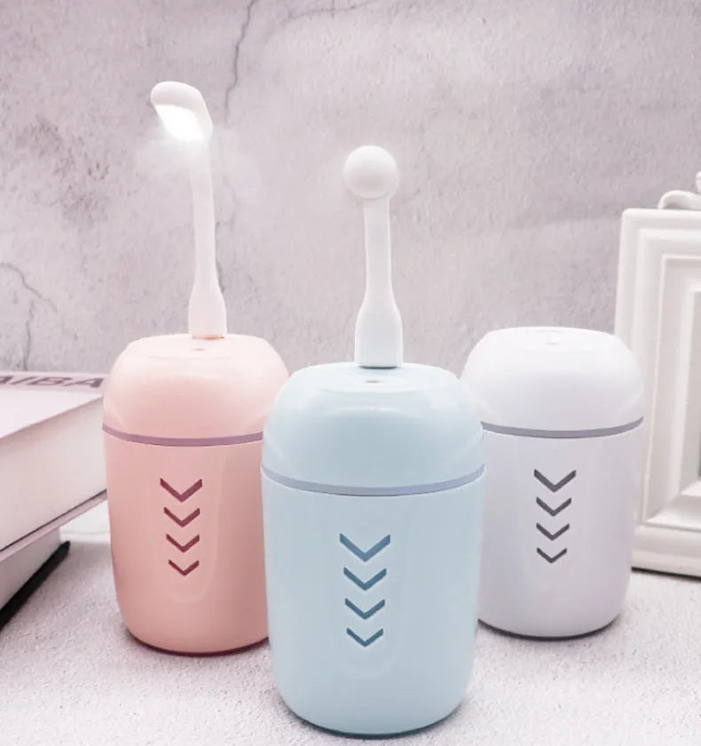 X3 portable car humidifier aromatherapy diffuser in blue, pink, or white with USB cable