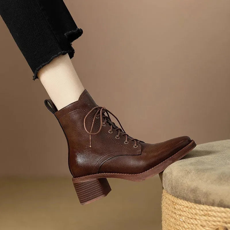 Women's black pointed-toe ankle boots with 5.5cm heel and artificial PU leather upper