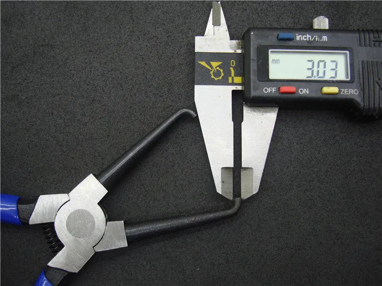 Caliper tubing pliers in iron with rubber handles, two sizes shown for fuel pipe connector removal