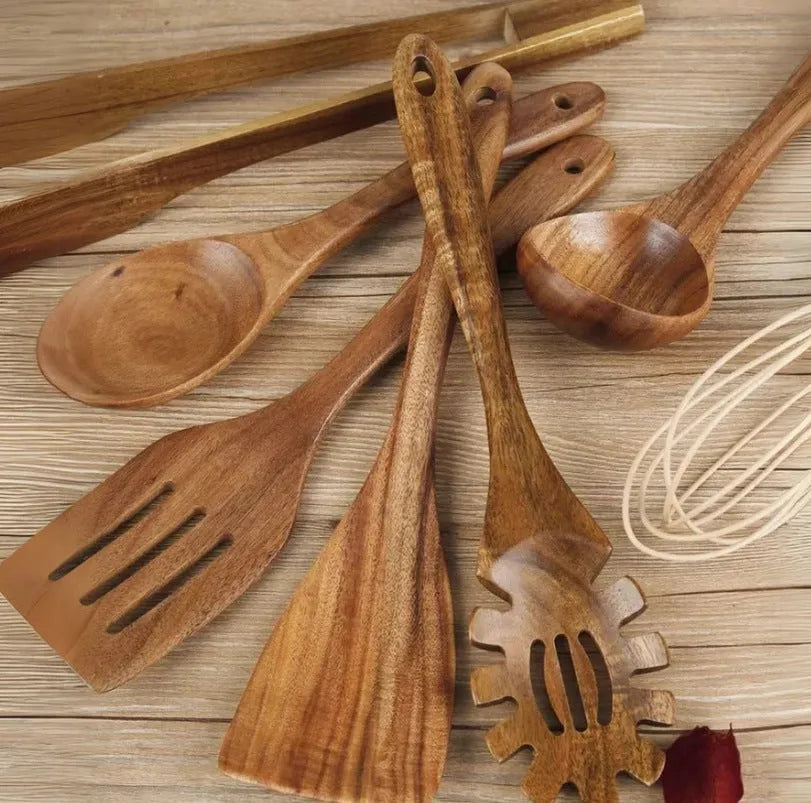 Seven-piece wooden cooking utensil set including spoon and slotted spoon for non-stick pans.