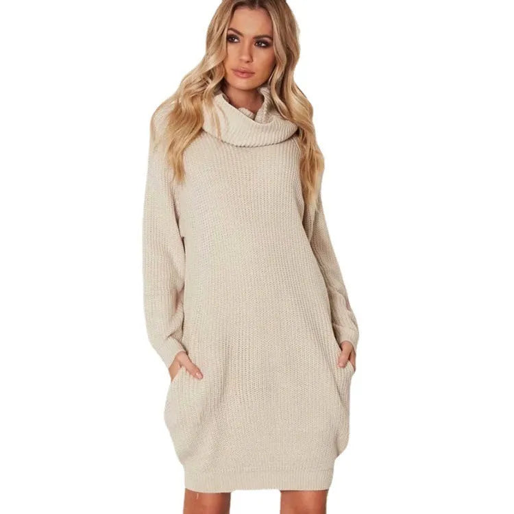 A woman's apricot-coloured pullover sweater with a V-neck lapel collar and side pockets on a hanger.