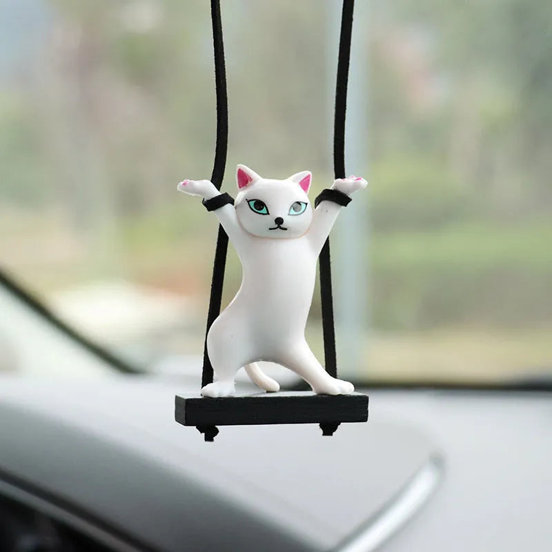 Cartoon-style resin cat pendant on a 25cm rope for hanging from a car rear-view mirror.