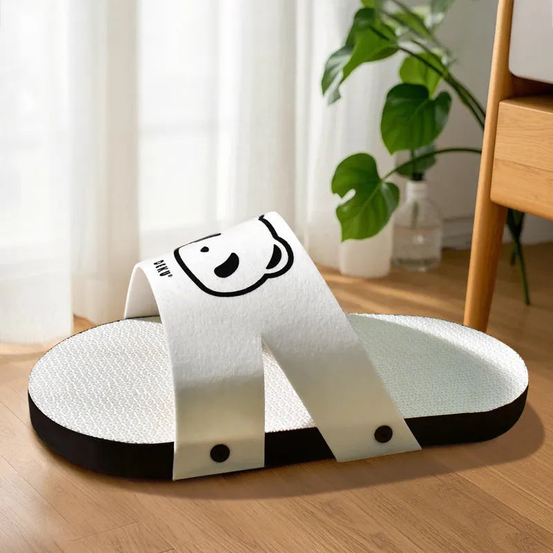 White corrugated paper cat scratch board with slipper-style design for indoor feline claw maintenance