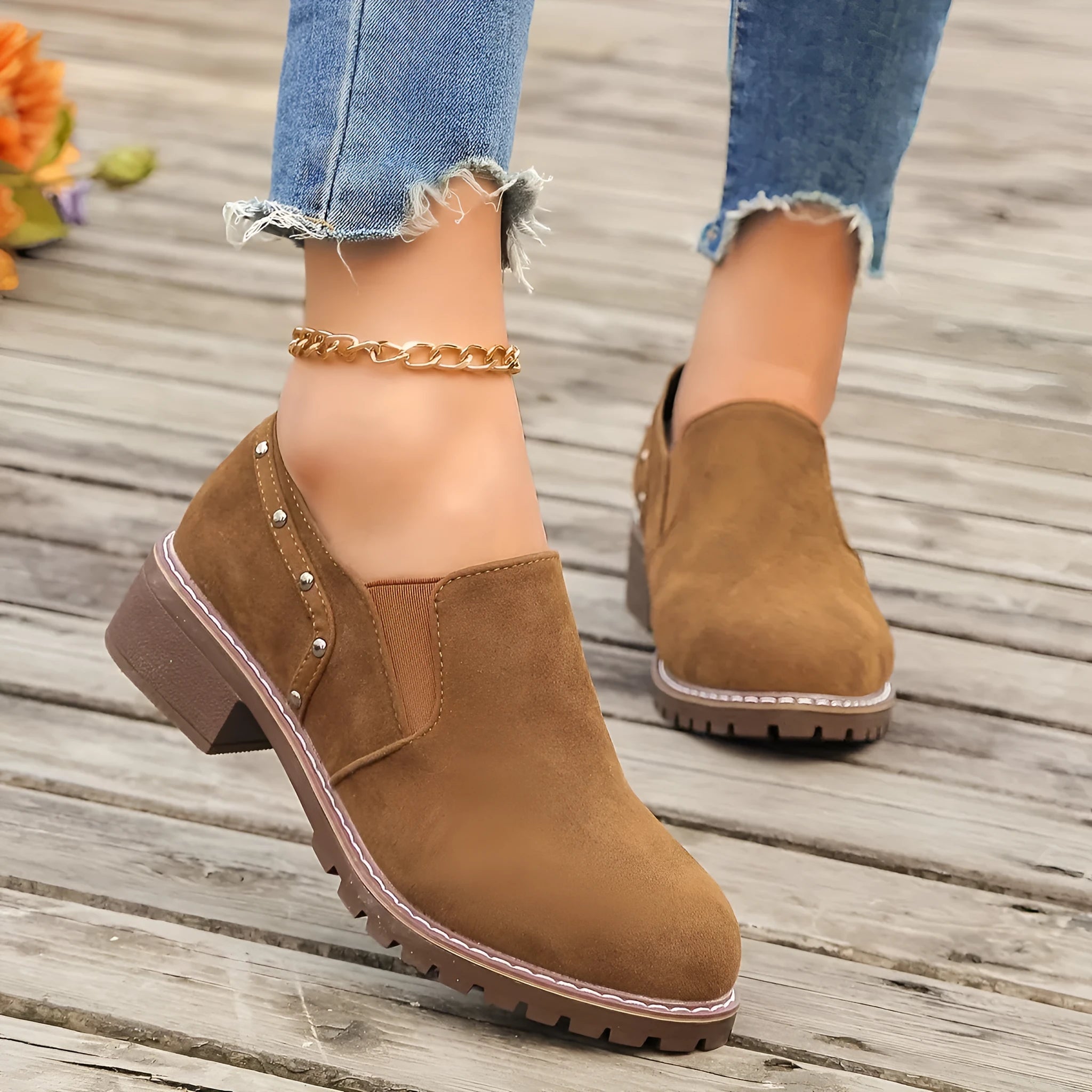 Plus size women's suede ankle boots with low heel, round toe, and elastic band in black