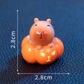 Set of eight micro landscape Halloween capybara resin decorations in assorted costumes including pumpkin and vampire
