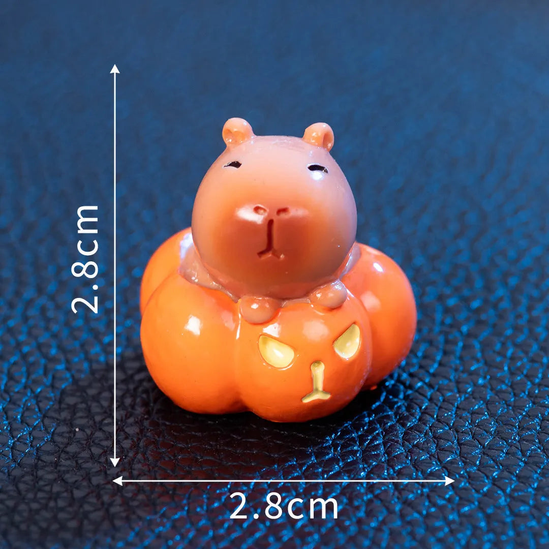 Set of eight micro landscape Halloween capybara resin decorations in assorted costumes including pumpkin and vampire