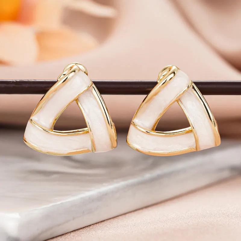 Women's yellow gold geometric triangle stud earrings with inlaid zircon on copper base