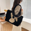Plush shoulder bag with cartoon rabbit ears design in solid colour with large capacity