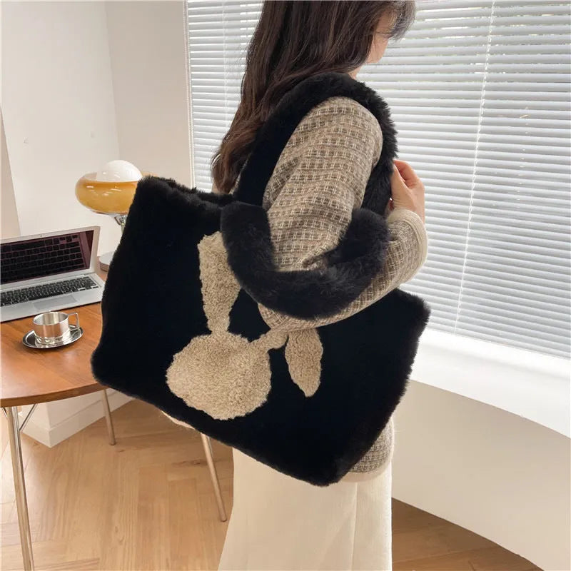 Plush shoulder bag with cartoon rabbit ears design in solid colour with large capacity